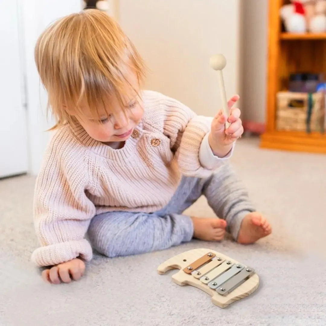 Offrez un éveil sensoriel unique avec ce xylophone bébé en bois.