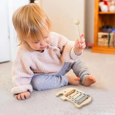 Offrez un éveil sensoriel unique avec ce xylophone bébé en bois.